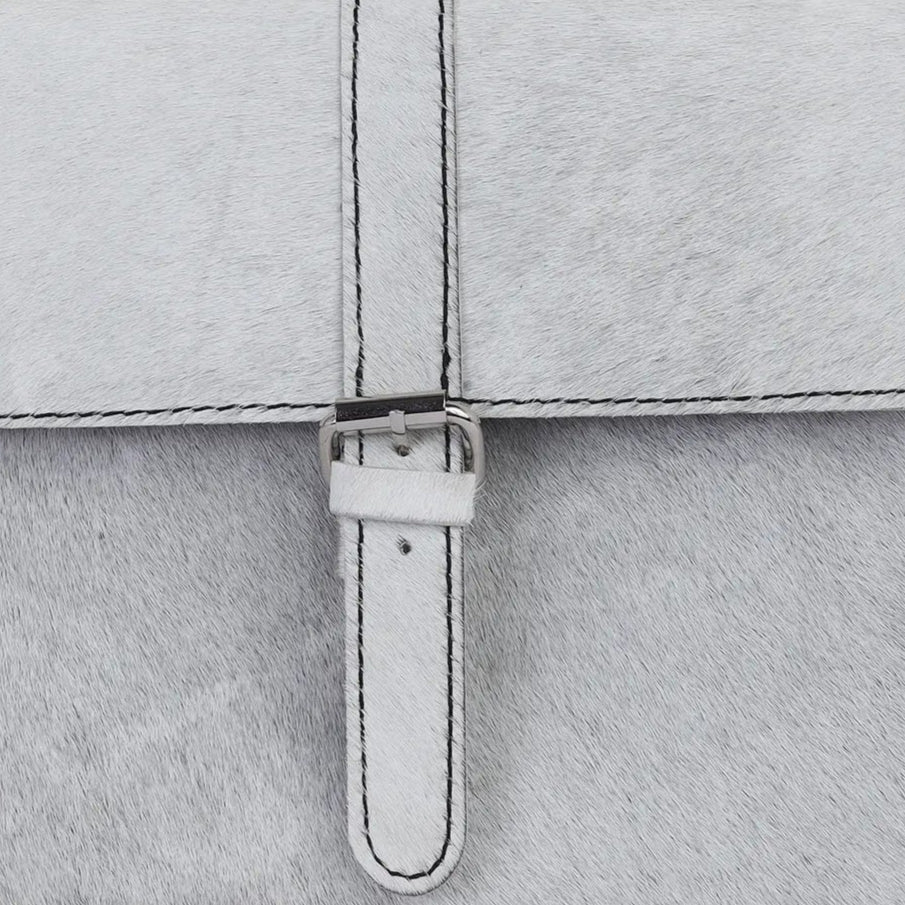 white backpack with a front pocket and zipper on a light gray background