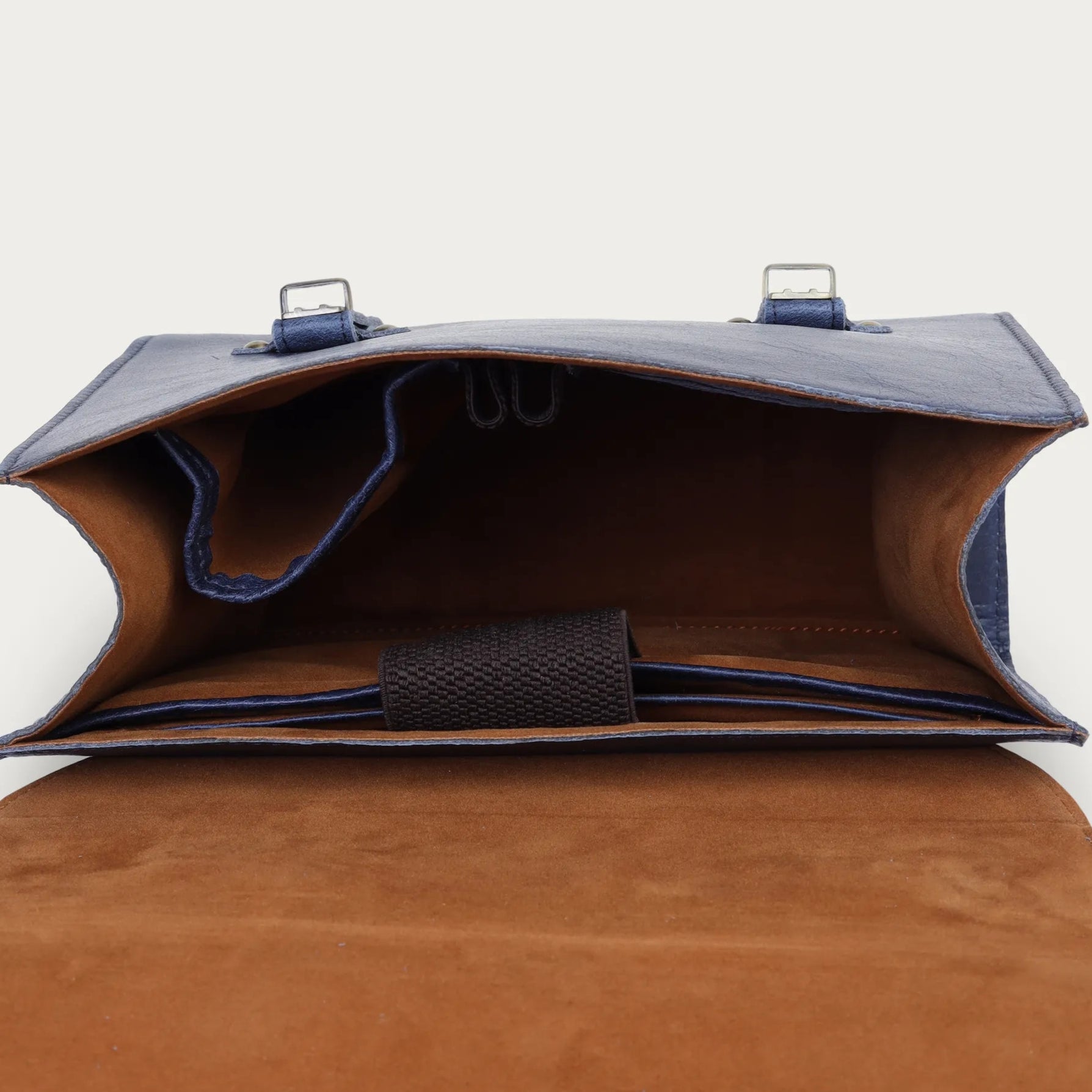 blue leather bag with a blue interior on a white background