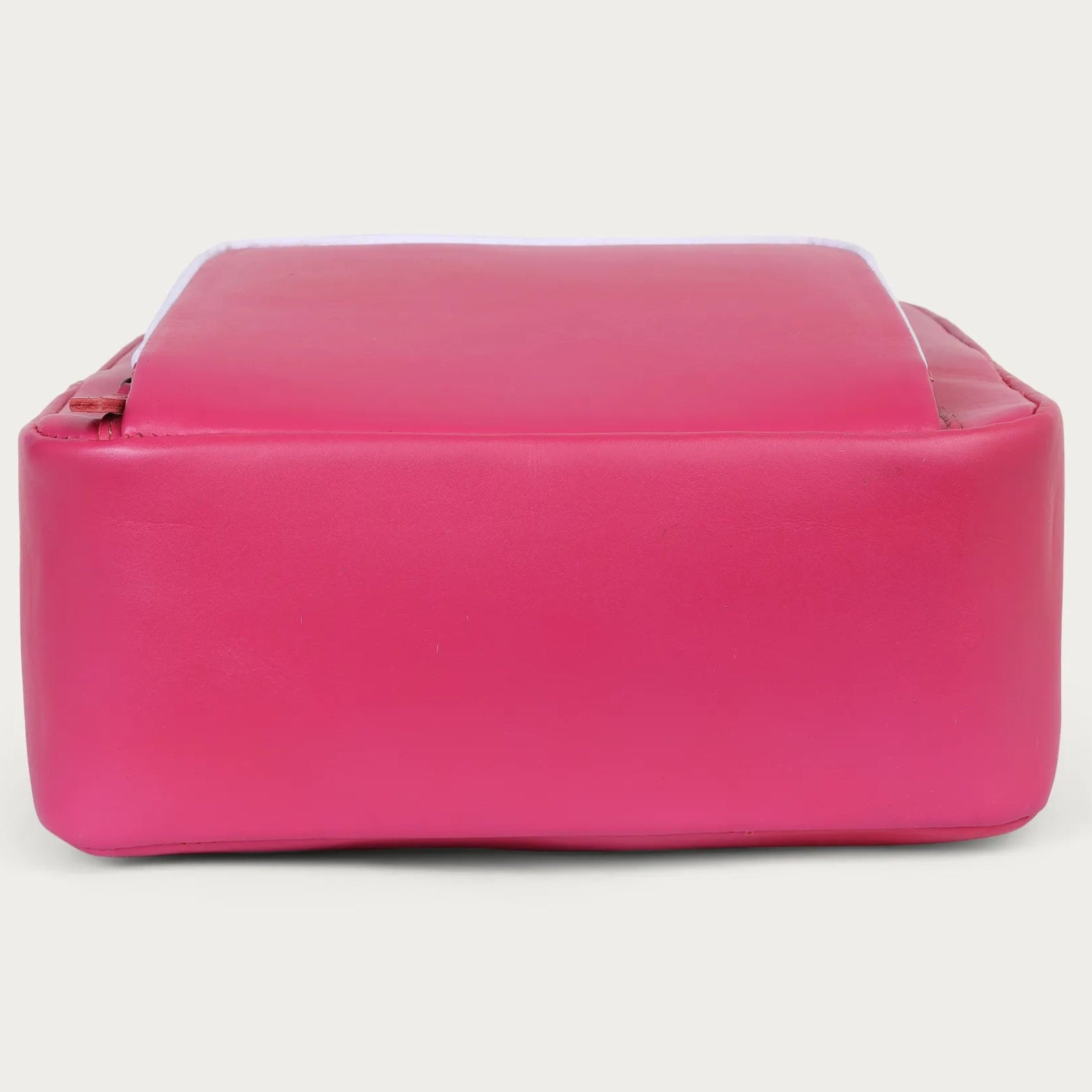 Pink handbag on a light gray background