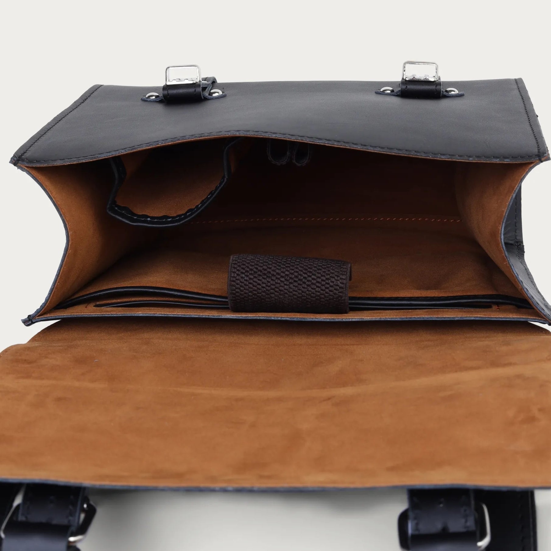 black leather bag with black accents on a white background