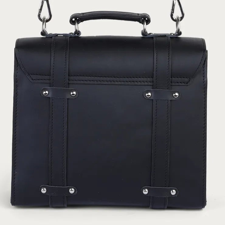 Black leather briefcase with a strap on a light gray background