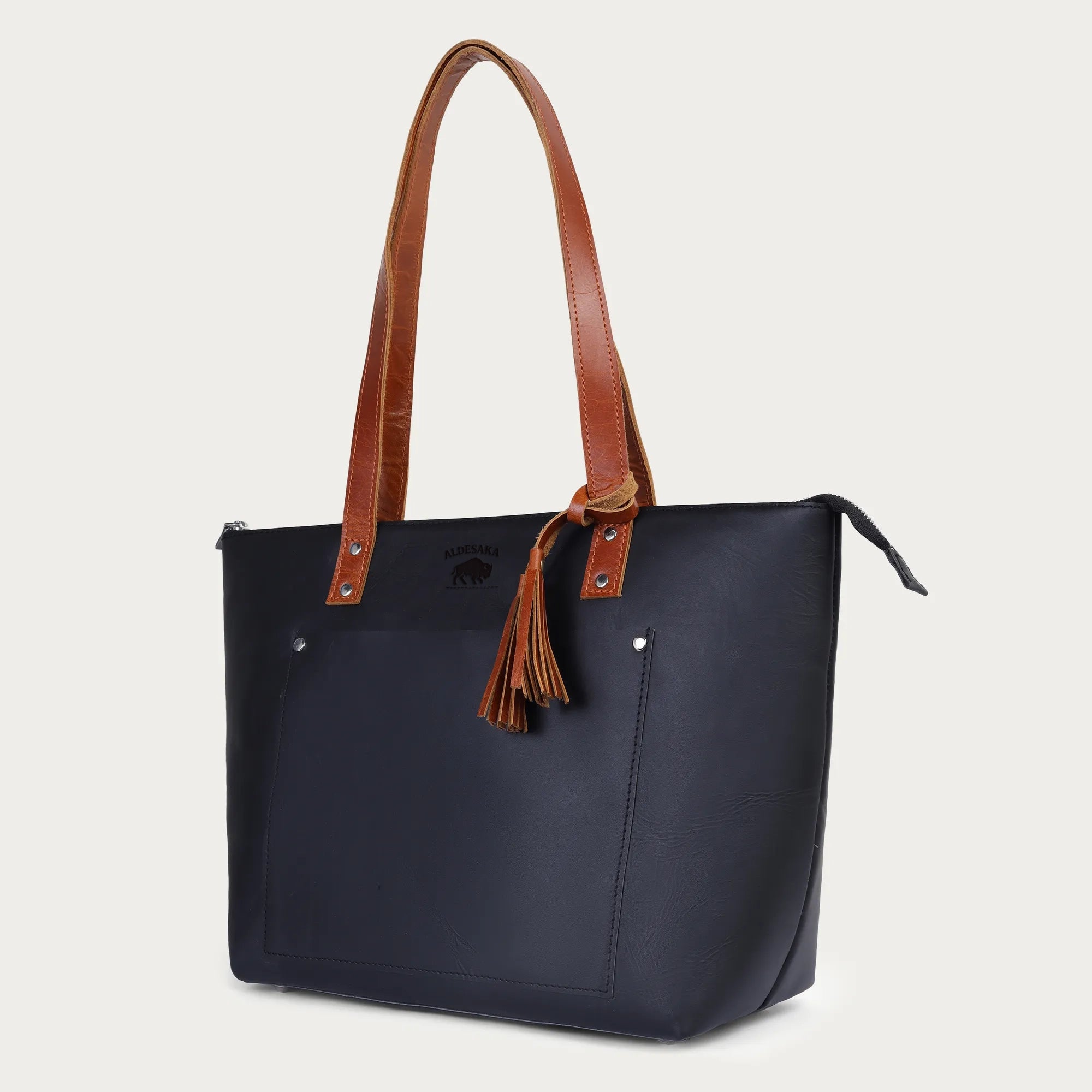 Open interior of full-grain leather tote with suede lining

