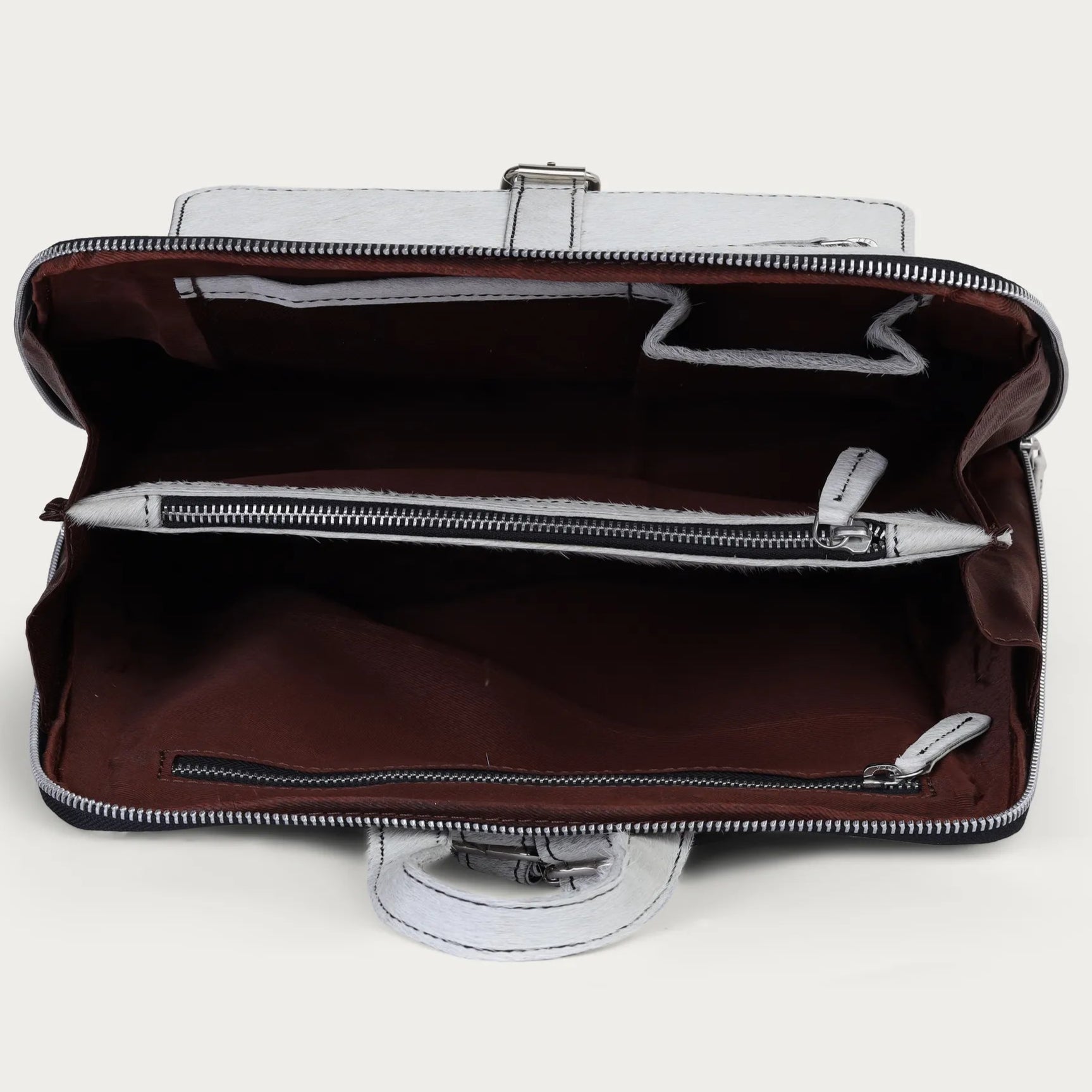 Open handbag on a white background